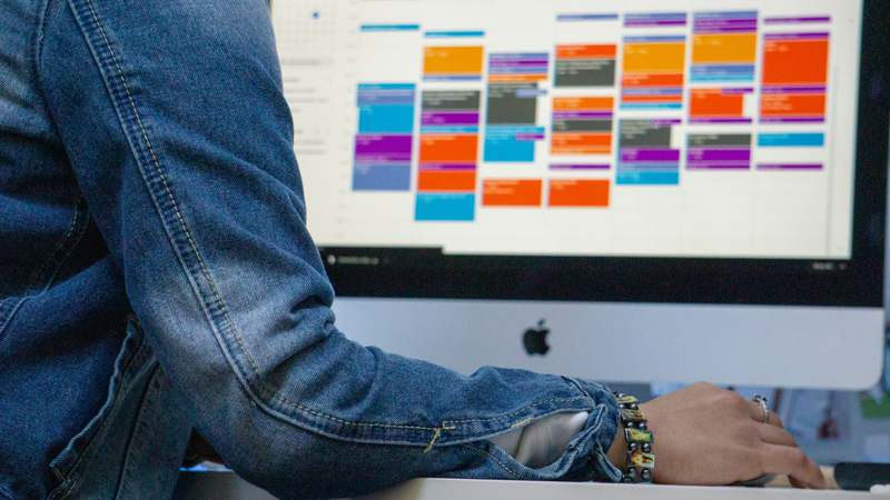 Clean interface of a modern video editing software showing multitrack timeline, preview window, and color grading panel